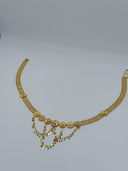 Full arc view of the gold-tone daisy flower coin drop mesh waist belt showing the clover-link mesh chain body, daisy medallion row, and cascading V-drape coin disc drops