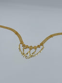 Full arc view of the gold-tone heart fan medallion coin drop mesh waist belt showing the clover-link mesh chain body, medallion row, and cascading V-drape coin disc drops