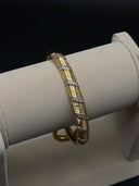 Parentesi Segmented Bangle – Gold